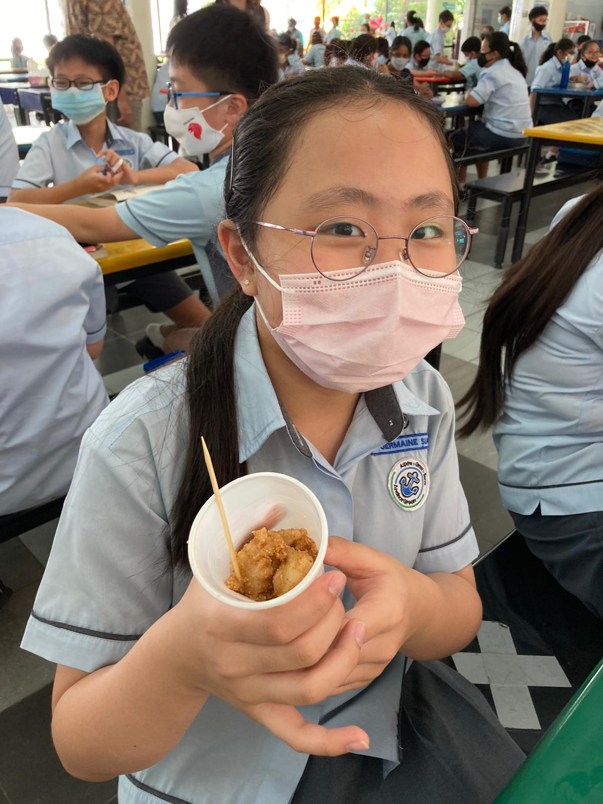 Student enjoying her meal